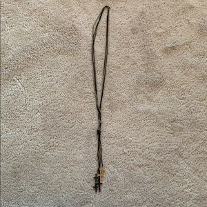 Cross necklace black and gold